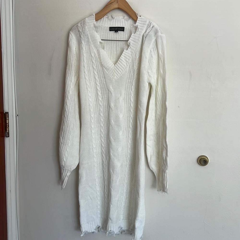 Creamy white distressed sweater dress